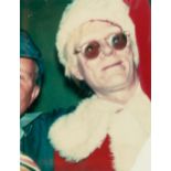 Brigid Berlin (1939-2020); Andy Warhol in Santa Costume;