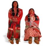 A large pair of store display-size Skookum dolls