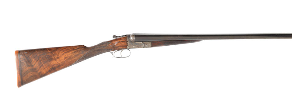 A 12-bore boxlock ejector gun by Arthur Hill, no. 3784 In an oak and leather case