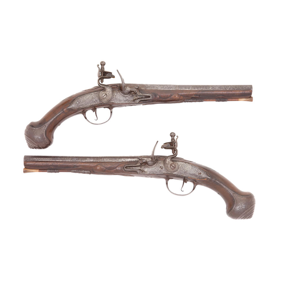 An Unusual Pair Of 25-Bore Flintlock Holster Pistols With Left And Right Hand Locks (2)