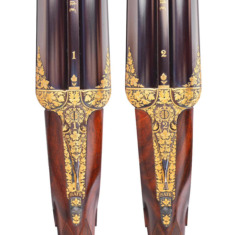 A very fine pair of K. C. Hunt engraved and gold-decorated 12-bore self-opening sidelock ejector... - Image 6 of 7