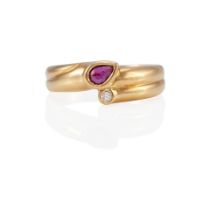 AN 18K GOLD, RUBY AND DIAMOND RING