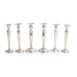 THREE PAIRS OF WEIGHTED STERLING CANDLESTICKS