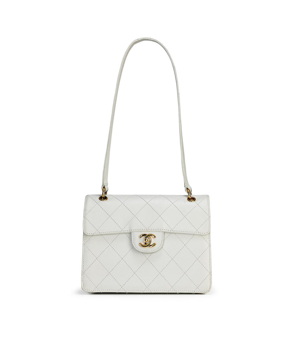 CHANEL: WHITE CAVIAR QUILTED FLAP BAG WITH GOLD TONED HARDWARE (Includes serial sticker, authent...