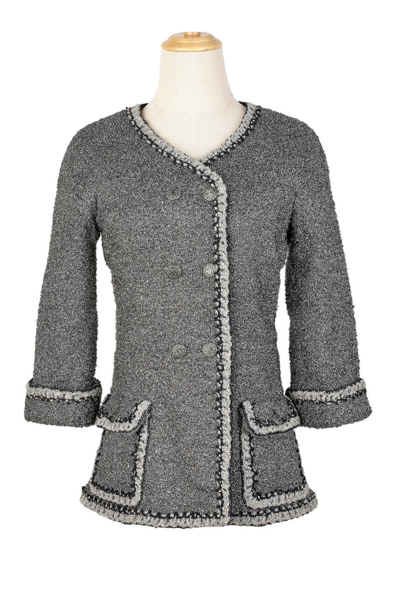 CHANEL: SILVER TONED GLITTER EFFECT NYLON JACKET EMBELLISHED CROCHET EDGING AND EMBOSSED CC LOGO...