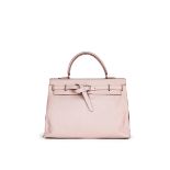 HERMÈS: ROSE DRAGEE SWIFT KELLY FLAT 35 WITH PALLADIUM HARDWARE (Includes original dust bag)