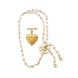 CHANEL: A SET OF 2 FAUX PEARL AND CAMELLIA BELT LENGTH 85CM AND CC ARROW HEART MOTIF GOLD TONED ...