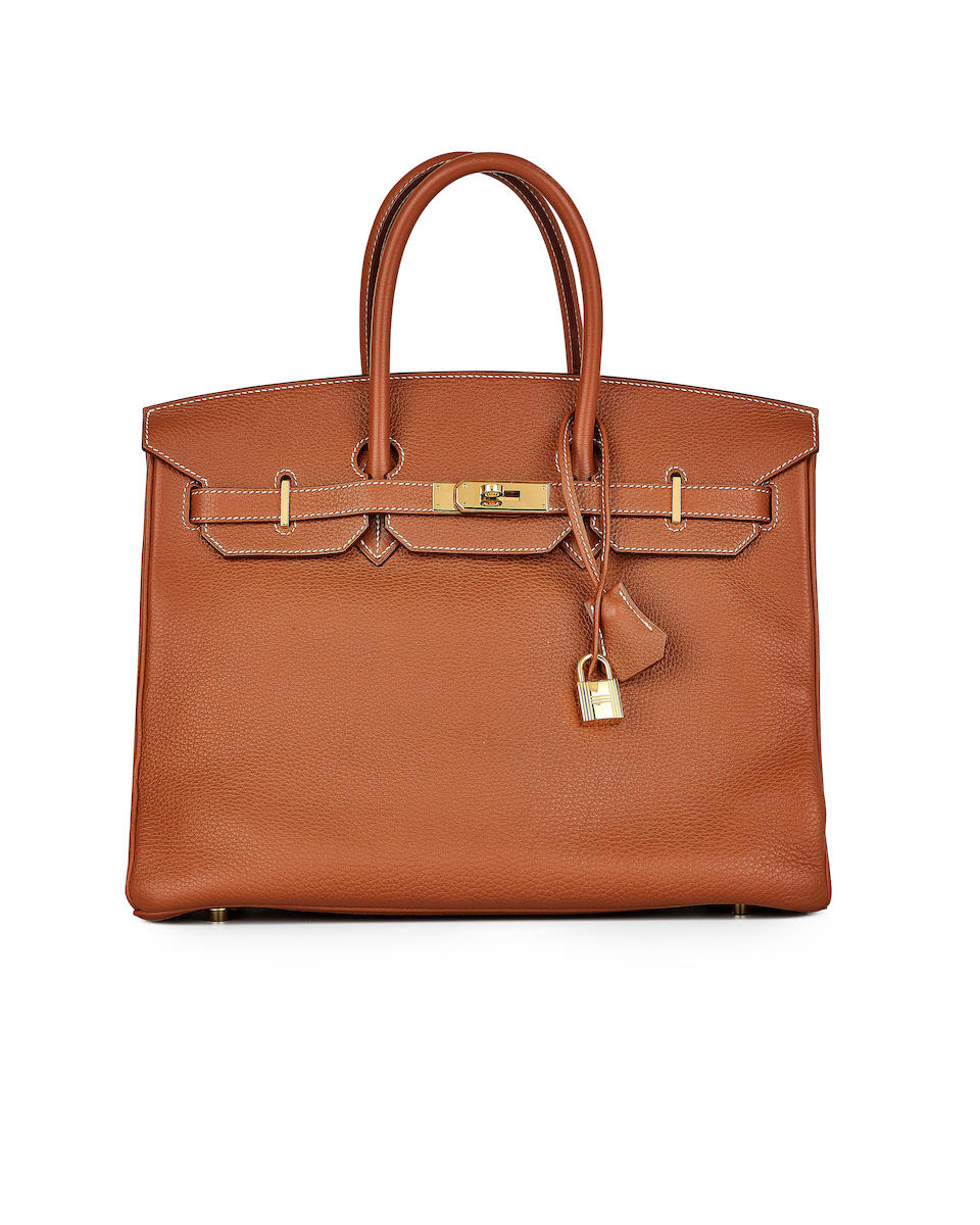 HERMÈS: GOLD CLEMENCE BIRKIN 35 WITH GOLD HARDWARE (Includes padlock, key, clochette, origi...