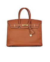 HERMÈS: GOLD CLEMENCE BIRKIN 35 WITH GOLD HARDWARE (Includes padlock, key, clochette, origi...