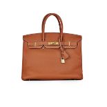 HERMÈS: GOLD CLEMENCE BIRKIN 35 WITH GOLD HARDWARE (Includes padlock, key, clochette, origi...