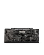 HERMÈS: BLACK SHINY CROCODILE POROSUS KELLY CUT WITH PALLADIUM HARDWARE (Includes original ...