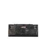 HERMÈS: BLACK SHINY CROCODILE POROSUS KELLY CUT WITH PALLADIUM HARDWARE (Includes original ...