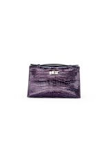 HERMÈS: AMETHYST SHINY ALLIGATOR KELLY POCHETTE WITH PALLADIUM HARDWARE (Includes felt prot...