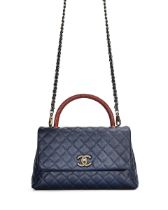 CHANEL: NAVY CAVIAR AND RED LIZARD COCO HANDLE WITH SILVER TONED HARDWARE (Includes serial stick...