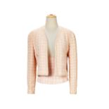 CHANEL: A SET OF PINK TWEED JACKET AND CORSET TOP (Includes replacement buttons, thread swatch f...