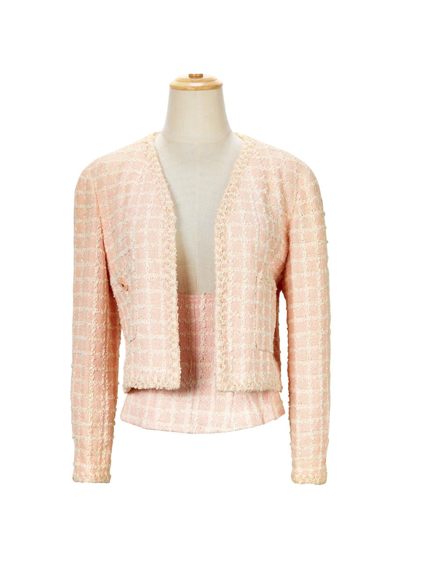 CHANEL: A SET OF PINK TWEED JACKET AND CORSET TOP (Includes replacement buttons, thread swatch f...