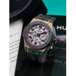 HUBLOT | BIG BANG 'FERRARI', A LIMITED EDITION TITANIUM AND YELLOW GOLD FLYBACK CHRONOGRAPH WRIS...