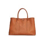 HERMÈS: GOLD CLEMENCE GARDEN PARTY 36 WITH PALLADIUM HARDWARE (Includes original dust bag)