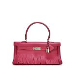 HERMÈS: A LIMITED EDITION WINE RUBI RED CLEMENCE FRINGE SHOULDER KELLY 42 WITH PALLADIUM HA...