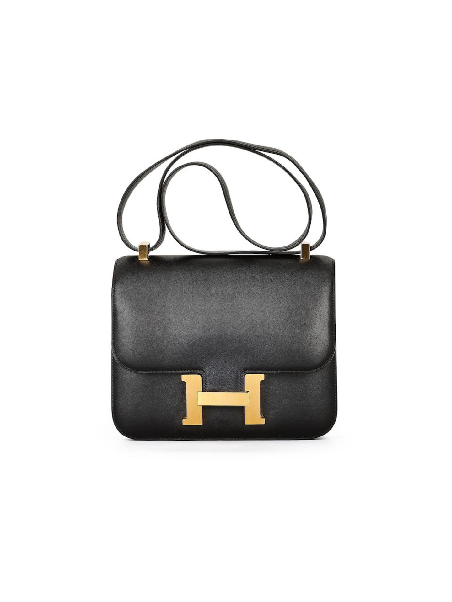 HERMÈS: BLACK SWIFT CONSTANCE 24 WITH GOLD HARDWARE (Includes booklet, felt protector, orig...