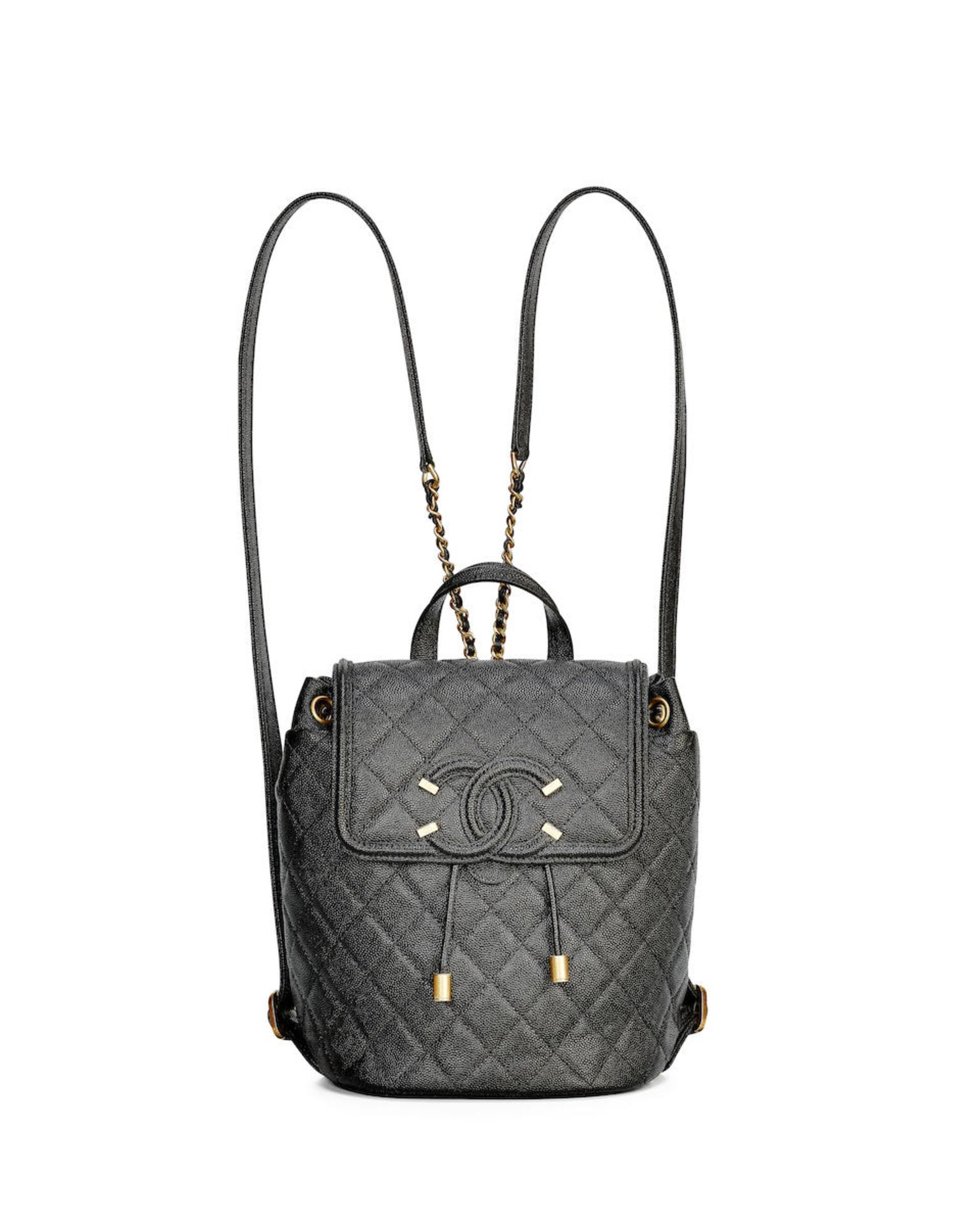CHANEL: BLACK CAVIAR QUILTED FILIGREE BACKPACK WITH GOLD TONED HARDWARE (Includes original dust ...
