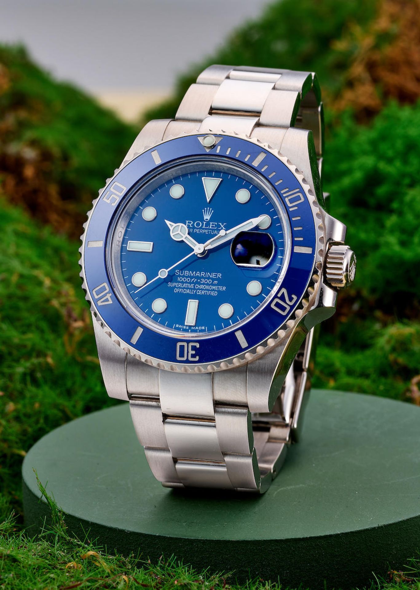 ROLEX | SUBMARINER, REF.116619LB 'SMURF', A WHITE GOLD BRACELET WATCH WITH DATE, CIRCA 2010