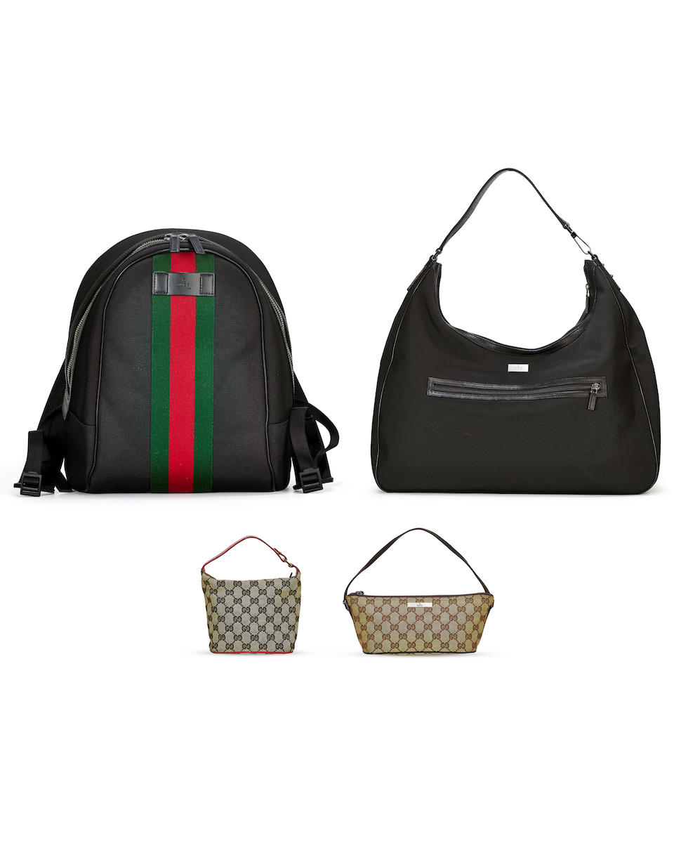 [NO RESERVE] GUCCI: A SET OF 4 BLACK JUMBO ZIP BOHO SHOULDER BAG WITH SILVER TONED HARDWARE; GG ...