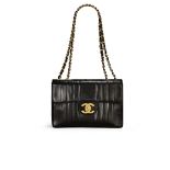 CHANEL: BLACK LAMBSKIN JUMBO VERTICAL STITCH CLASSIC FLAP BAG WITH GOLD TONED HARDWARE (Includes...