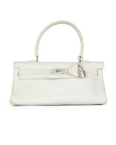 HERMÈS: SNOW WHITE TAURILLON CLEMENCE SHOULDER KELLY 42 WITH PALLADIUM HARDWARE (Includes p...