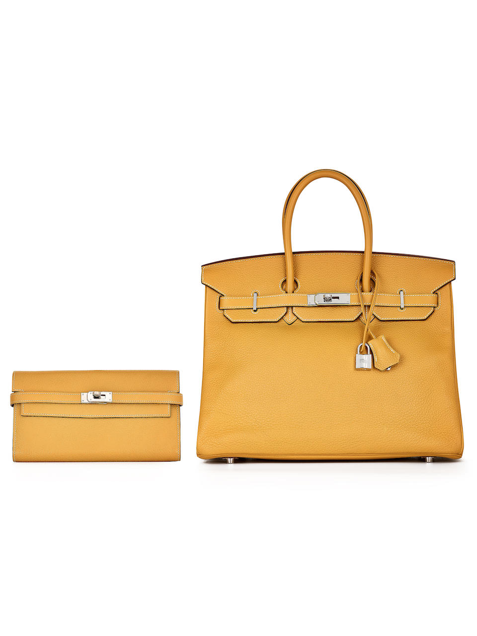 HERMÈS : A SET OF 2 CURRY YELLOW CLEMENCE BIRKIN 35 ; TOGO KELLY WALLET WITH PALLADIUM HARD...