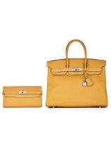 HERMÈS : A SET OF 2 CURRY YELLOW CLEMENCE BIRKIN 35 ; TOGO KELLY WALLET WITH PALLADIUM HARD...