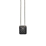 CHANEL: BLACK MATELASSÉ LAMBSKIN QUILTED VANITY CASE WITH GOLD TONED CHAIN (Includes origin...