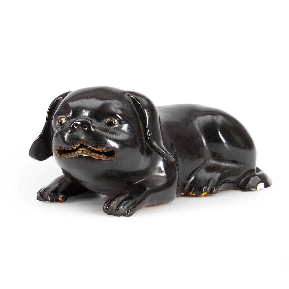 A BLACK-GLAZED PUG-FORM CENSER