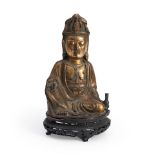 A GILT BRONZE FIGURE OF GUANYIN