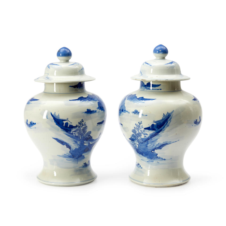 A NEAR PAIR OF BLUE AND WHITE 'LANDSCAPE' JARS AND COVERS - Image 3 of 4