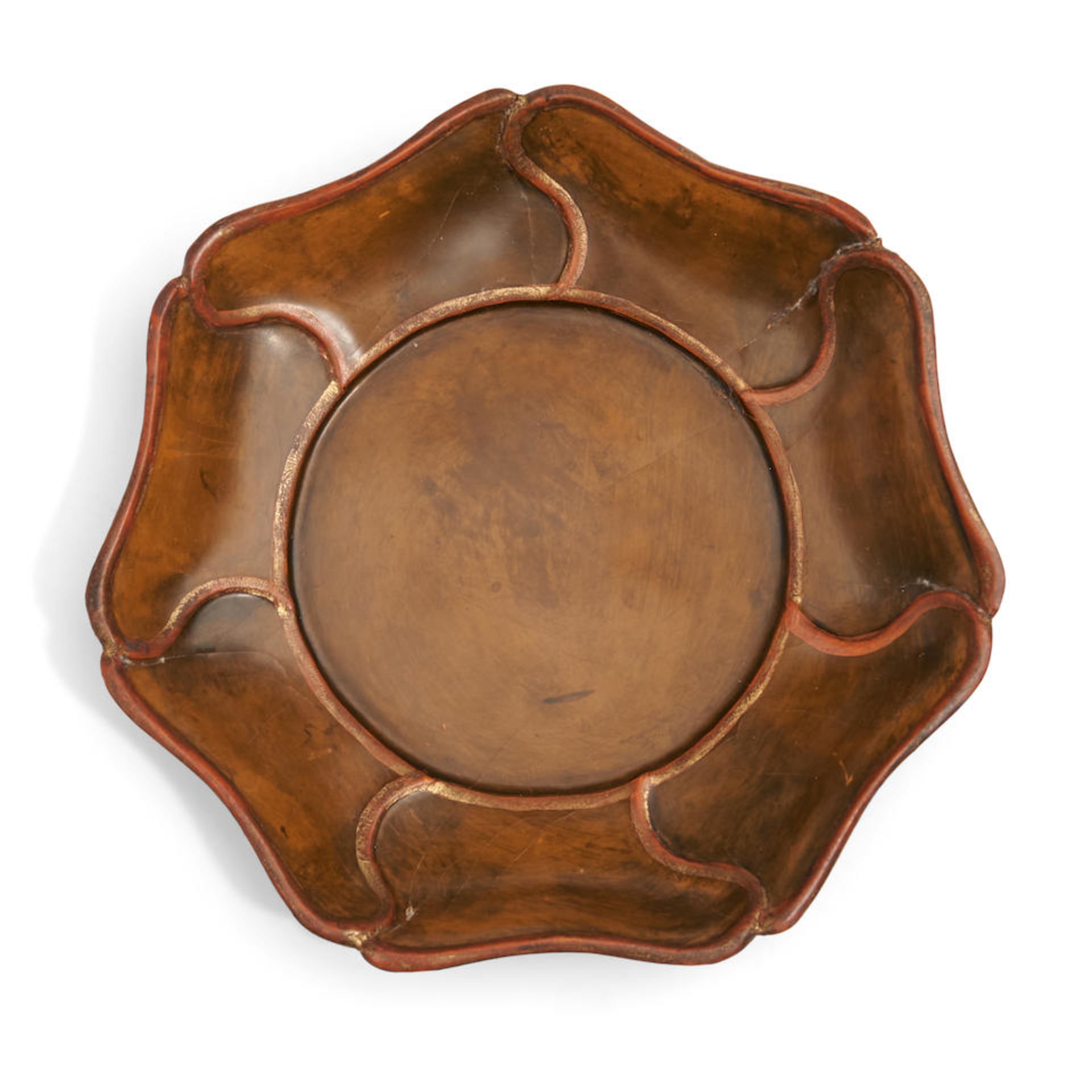 A LIGHT BROWN-LACQUERED MALLOW-FORM DISH