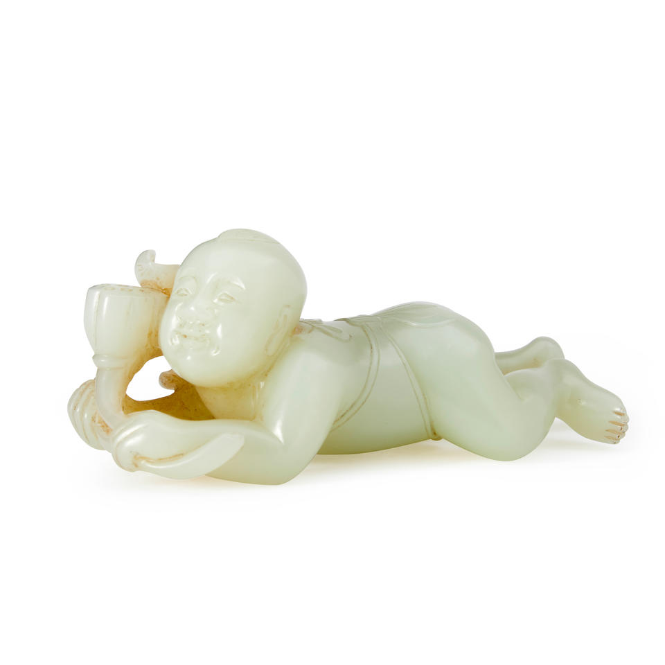 A NEPHRITE CARVING OF A BOY