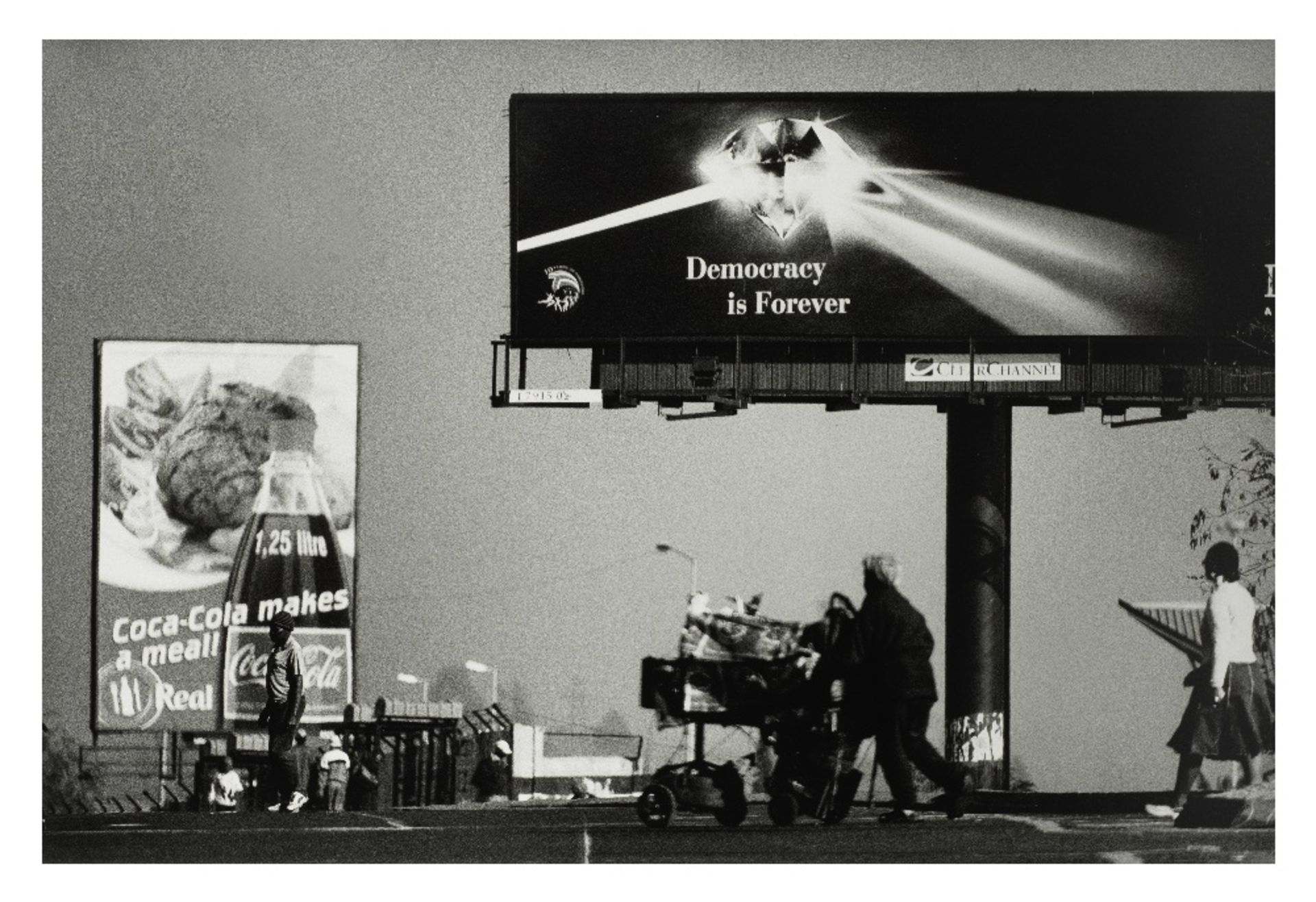 Santu Mofokeng (South African, 1956-2020) Billboard Series: Democracy is Forever, Pimville (2004).