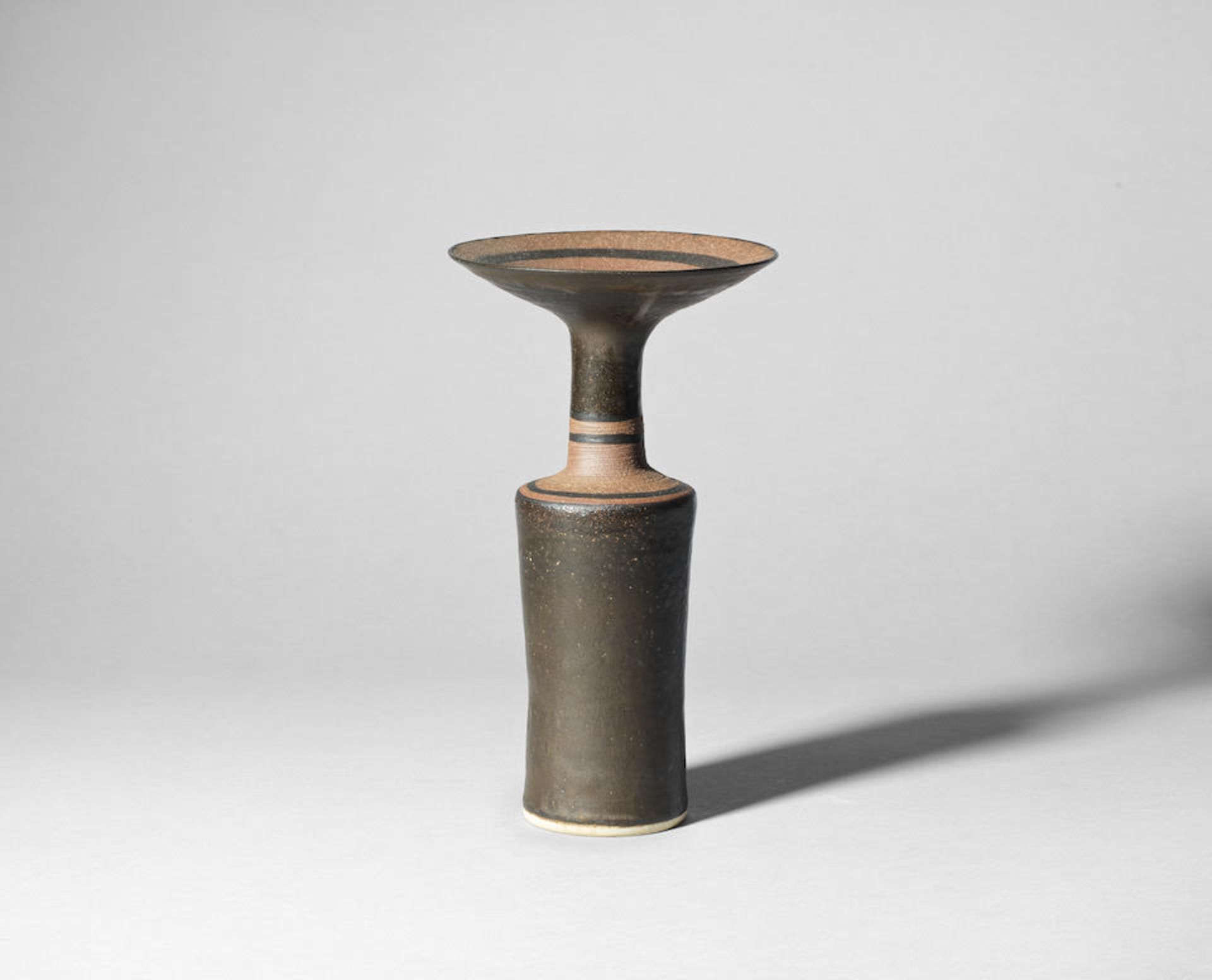 Lucie Rie Cylindrical vase with flaring lip, circa 1985