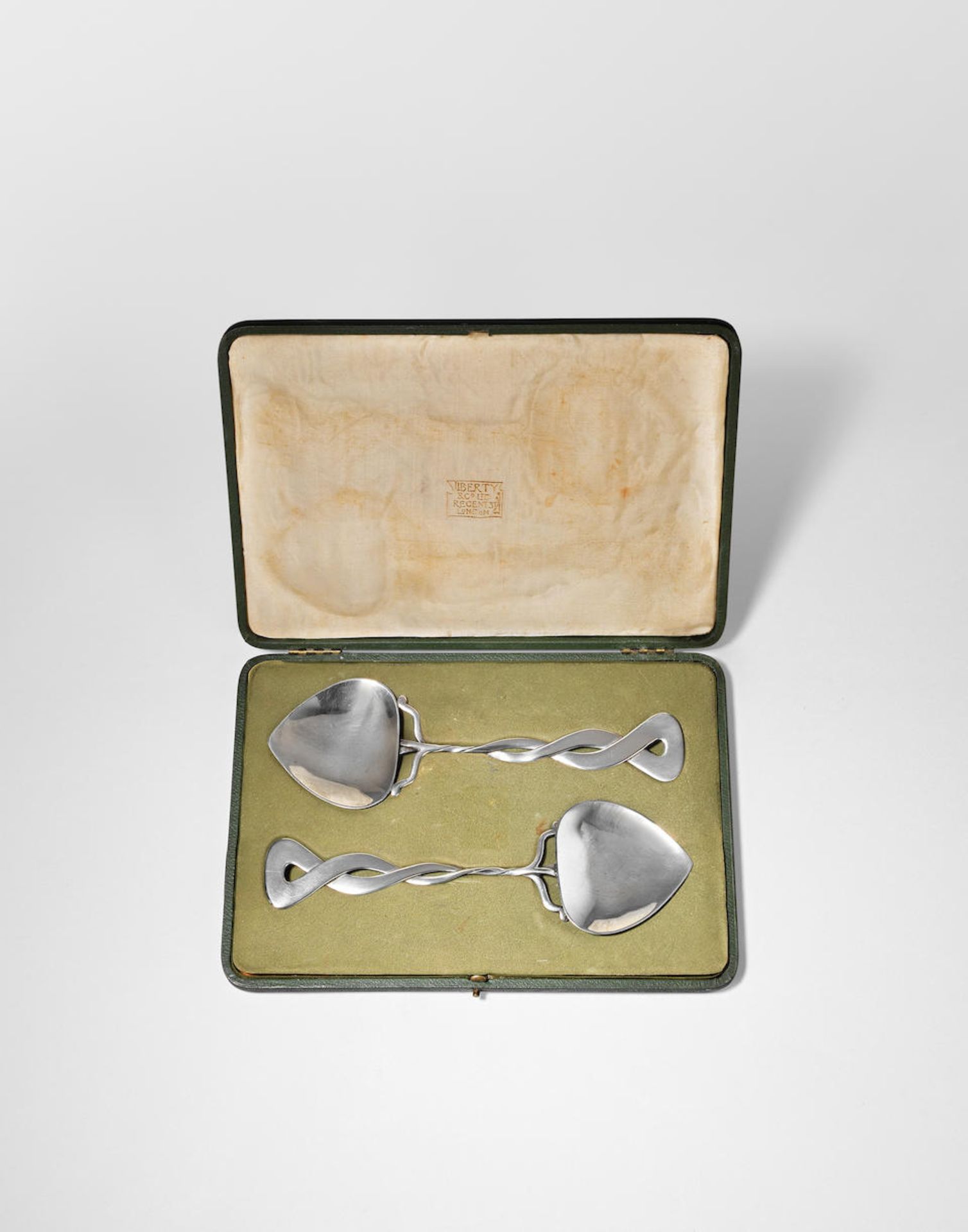 Oliver Baker Pair of 'cymric' spoons, 1902