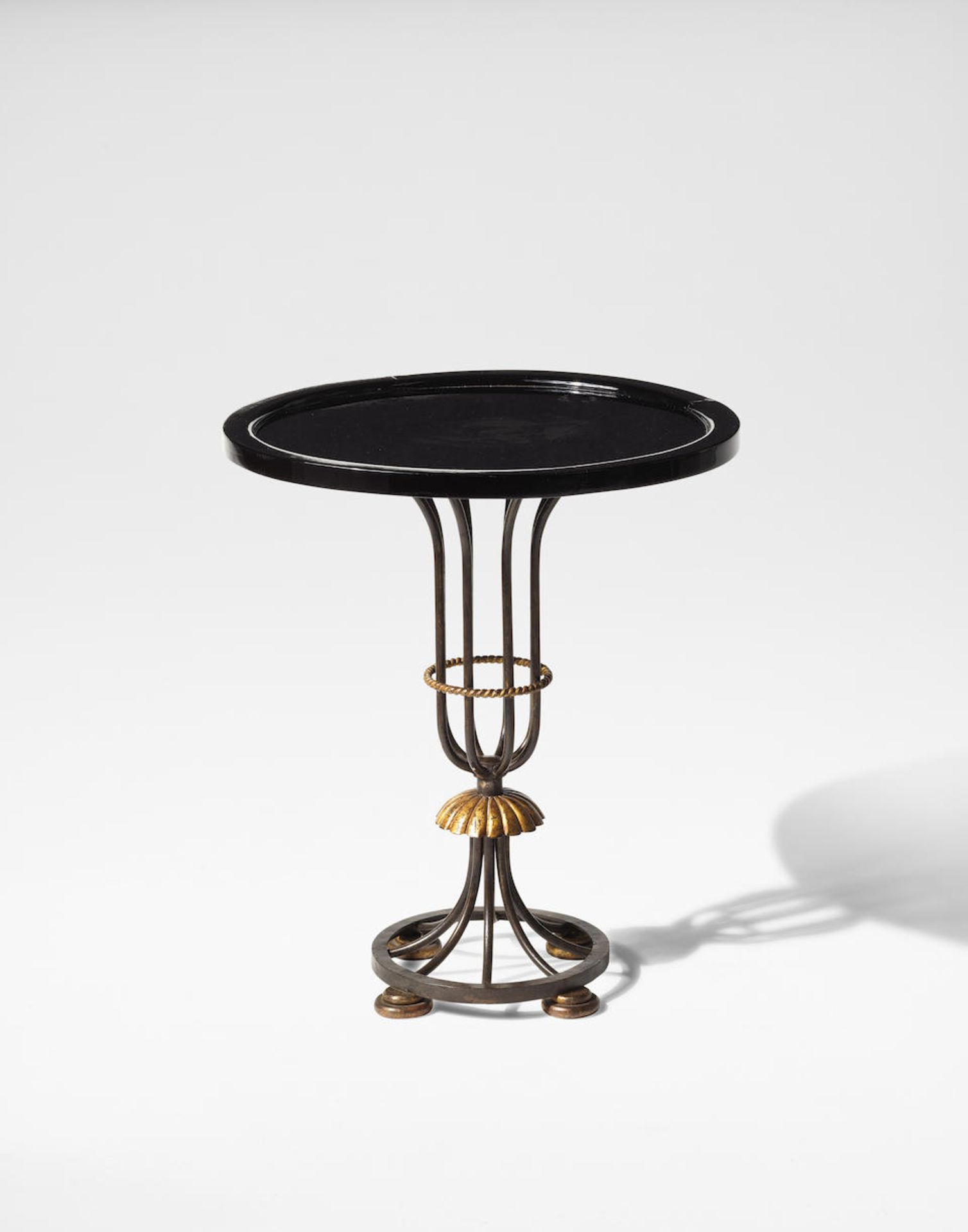 In the style of Gilbert Poillerat Occasional table, 20th century