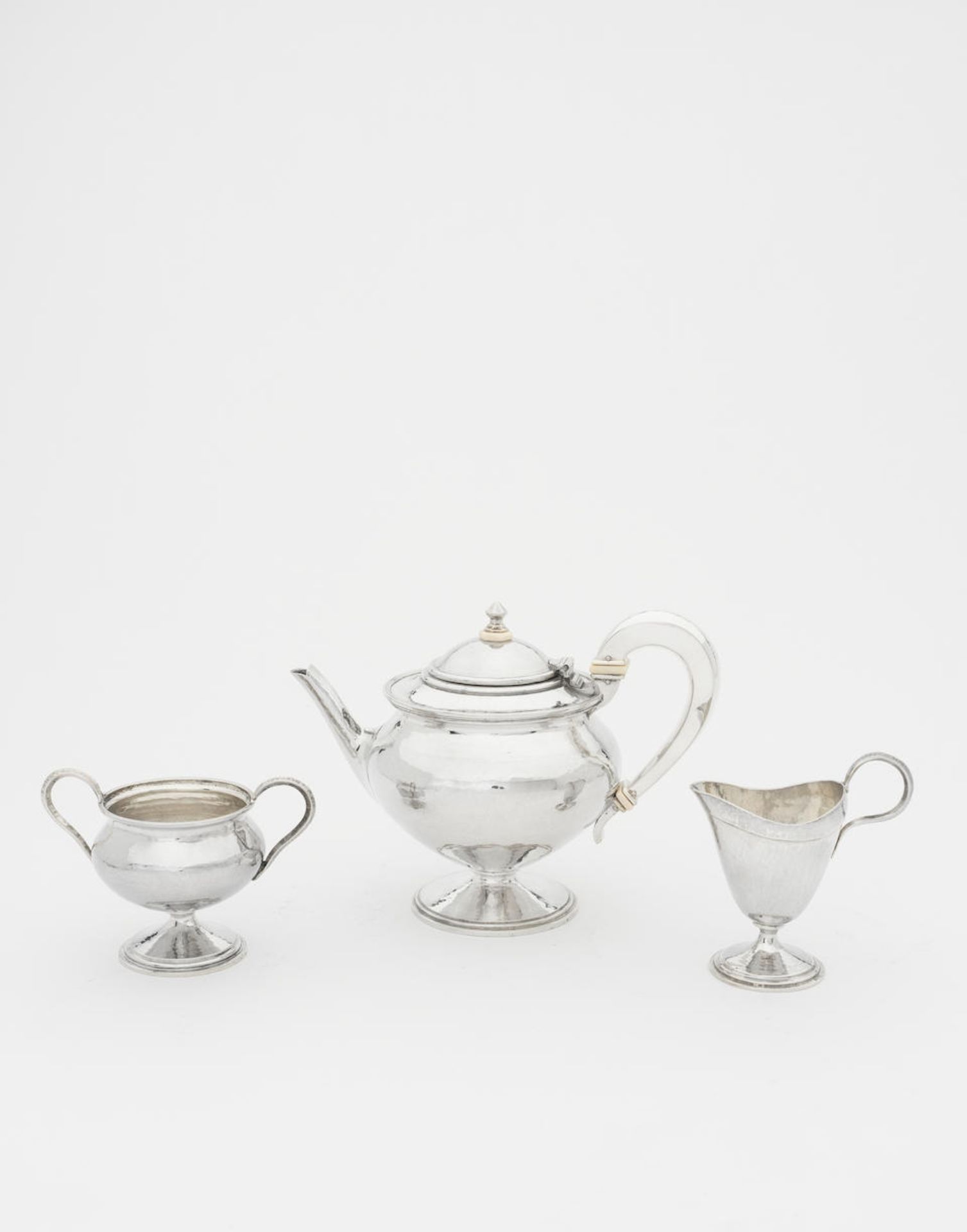 Omar Ramsden Three-piece tea set, 1923