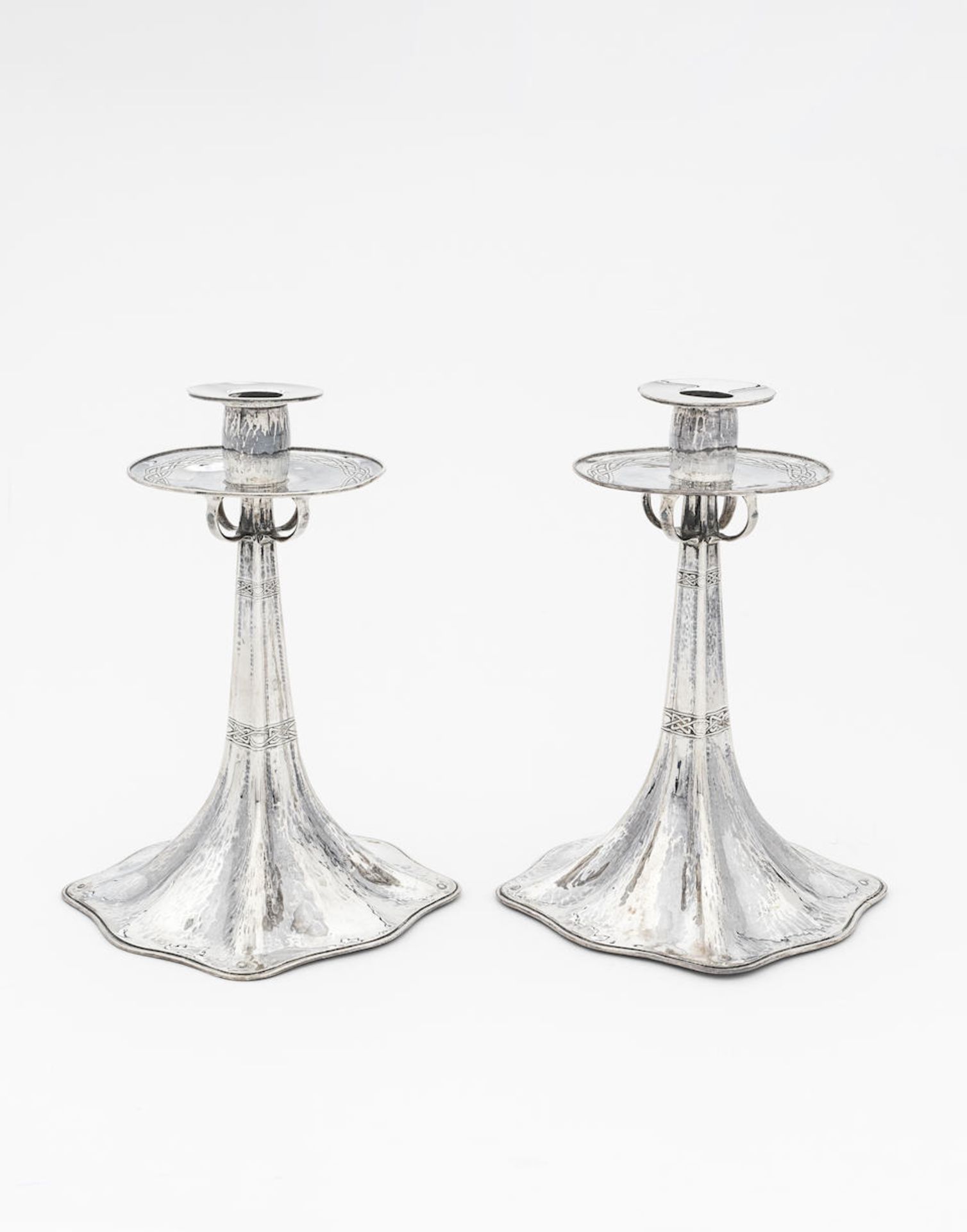 Omar Ramsden & Alwyn C.E. Carr Pair of candlesticks, 1907