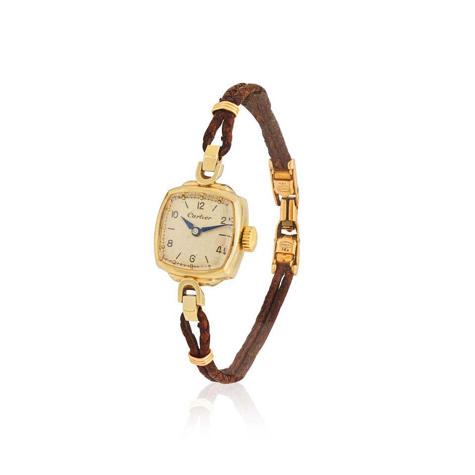 Girard-Perregaux for Cartier. A lady's 14K gold manual wind wristwatch Girard-Perregaux pour Car...