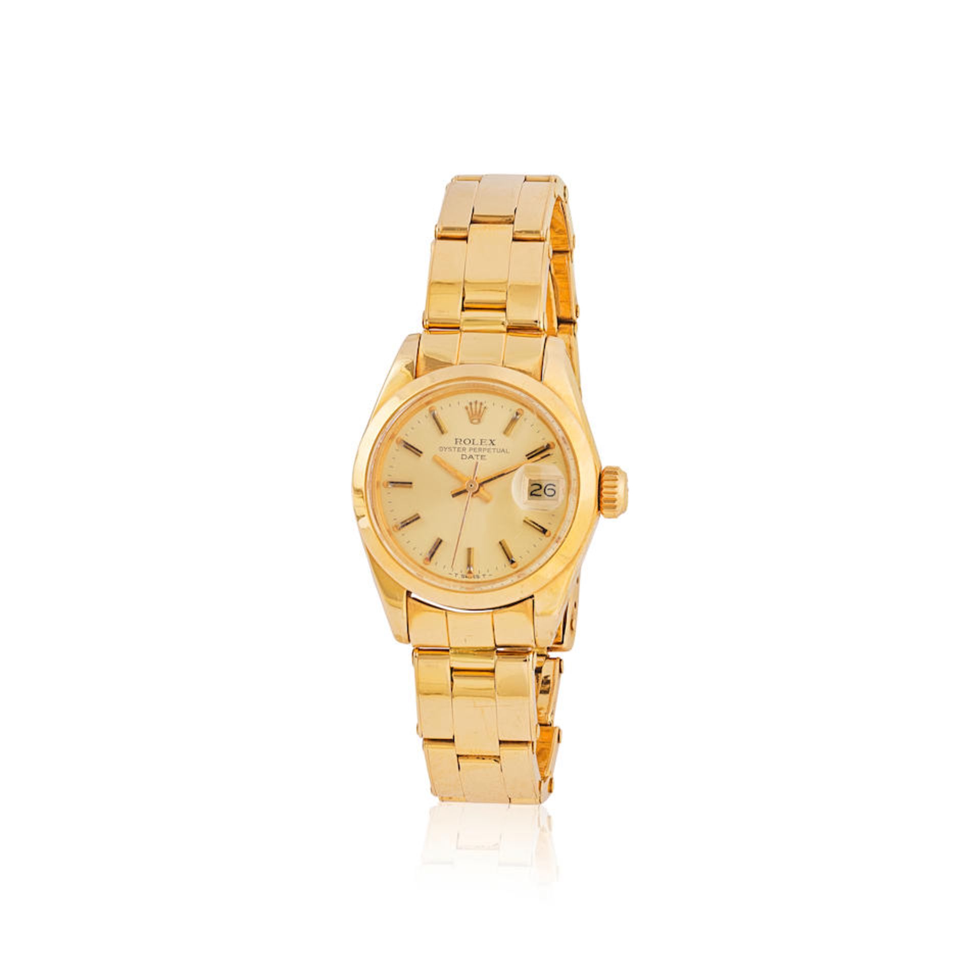 Rolex. A fine lady's 18K gold automatic calendar bracelet watch Rolex. Belle montre de dame en o...