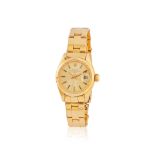 Rolex. A fine lady's 18K gold automatic calendar bracelet watch Rolex. Belle montre de dame en o...