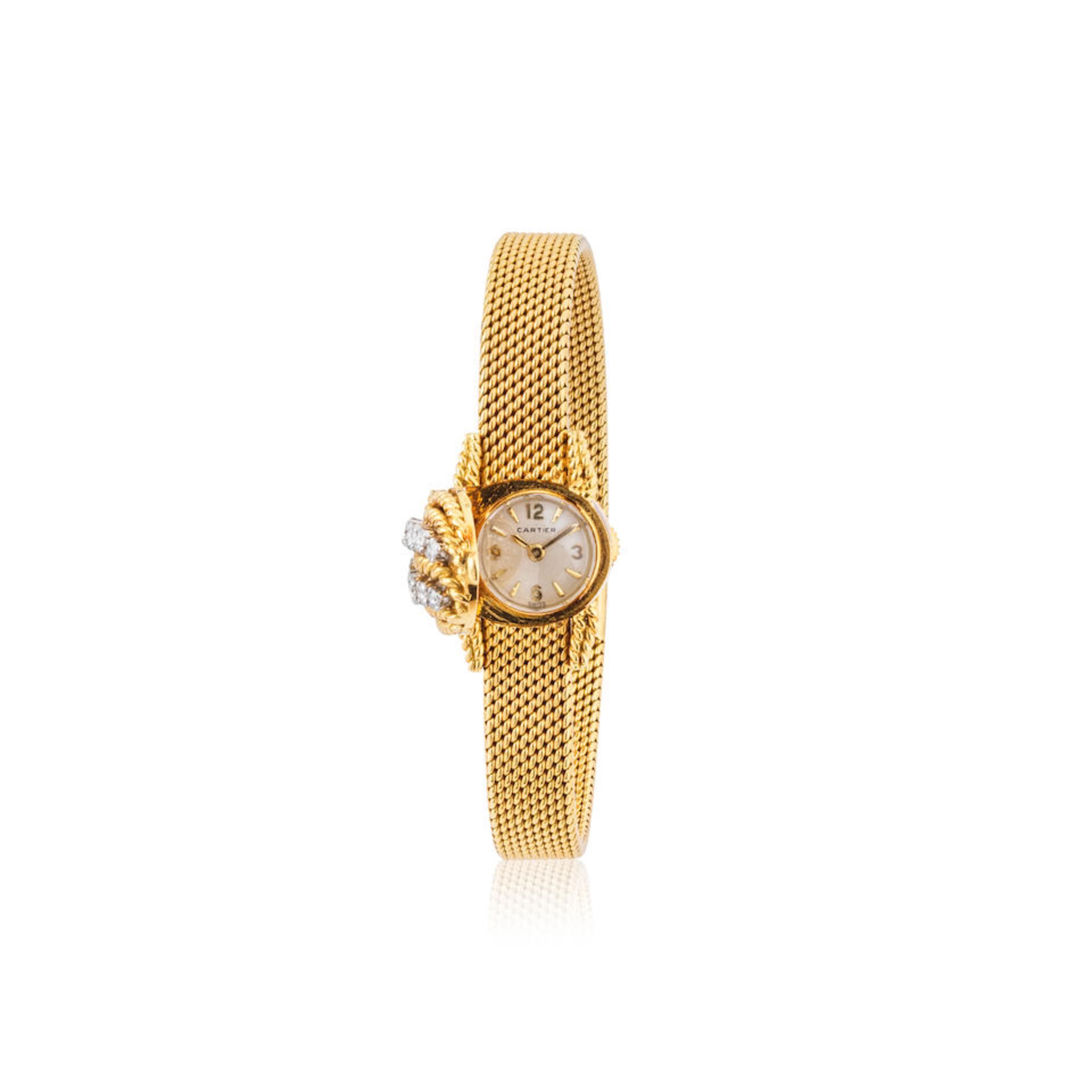 Cartier. A fine lady's 18K gold manual wind bracelet watch with diamond set and concealed dial C... - Bild 2 aus 2