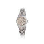 Rolex. A fine 18K white gold automatic calendar bracelet watch Rolex. Belle montre de dame en or...