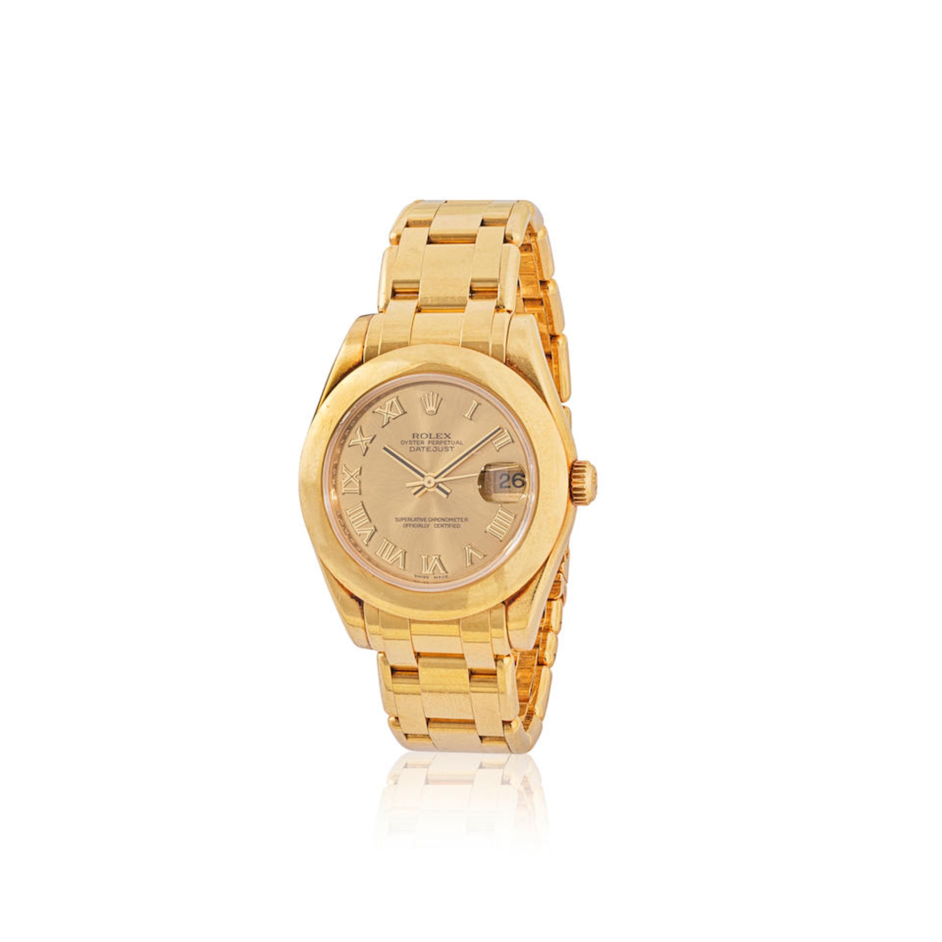 Rolex. A mid size 18K gold automatic calendar bracelet watch Rolex. Montre bracelet en or jaune ...