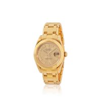 Rolex. A mid size 18K gold automatic calendar bracelet watch Rolex. Montre bracelet en or jaune ...